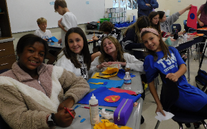  7th Grade girls work together on the 2021 Day of Service.